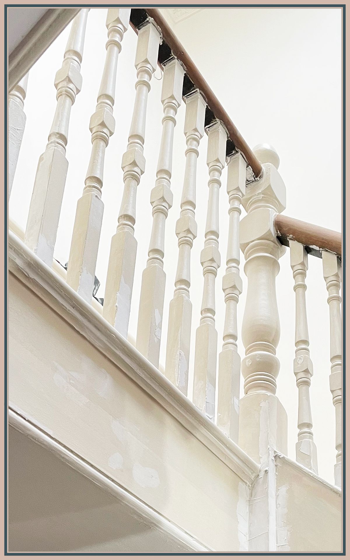 Freshly decorated staircase with crisp painted trim and walls