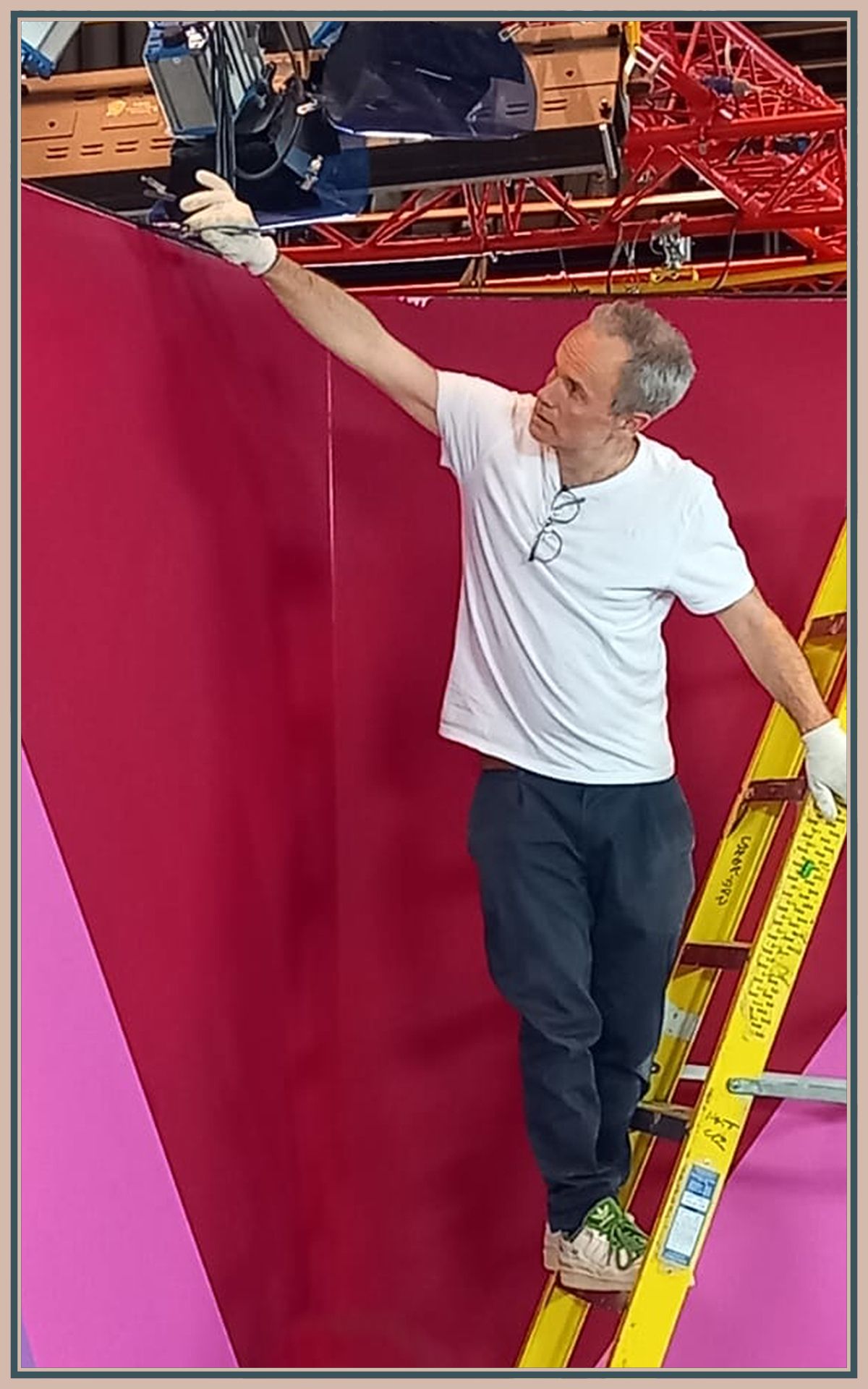Decorator preparing an interior wall for a high-quality finish